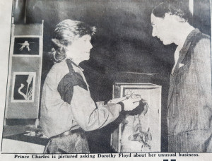 Photo of Dorothy Floyd and Prince Charles Newspaper clipping of business
